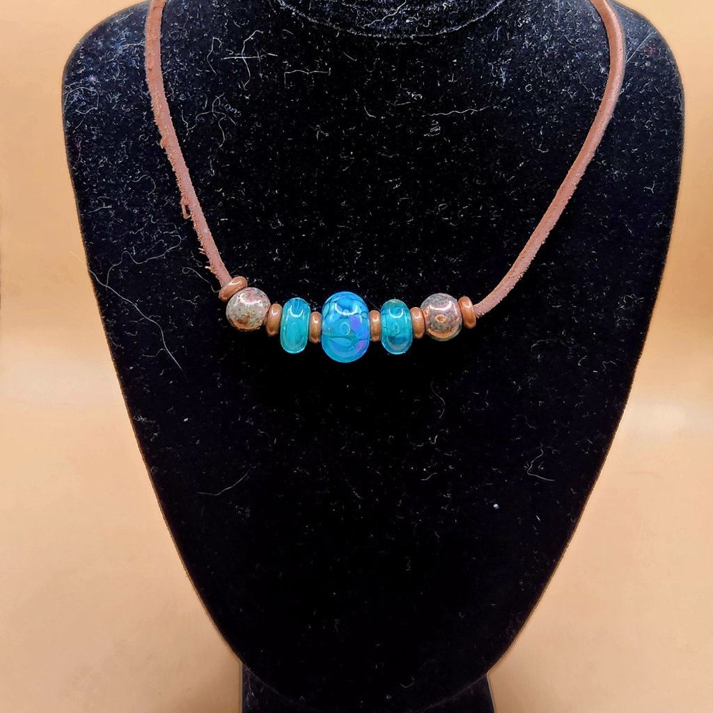 Teal Lampwork, Copper And Raku Ceramic Beads On A Rawhide Cord